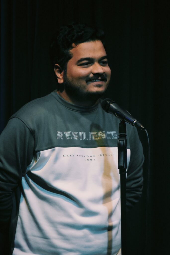 Amar performing at his first open mic in Bangalore — a poetic moment of courage and expression.